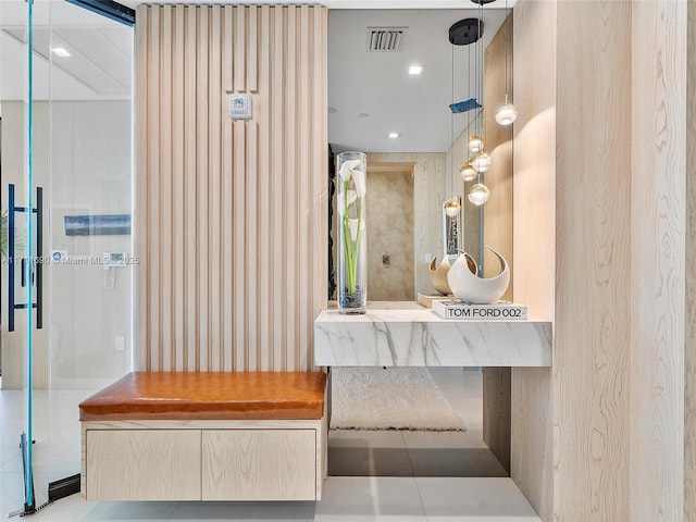 bathroom featuring tile patterned flooring