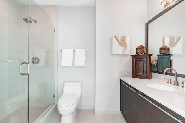 bathroom with walk in shower, vanity, and toilet