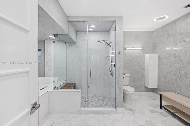 bathroom featuring walk in shower and toilet