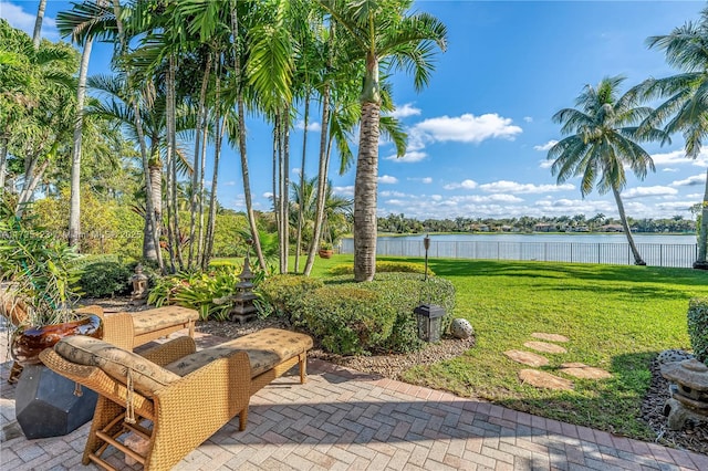 view of patio with a water view