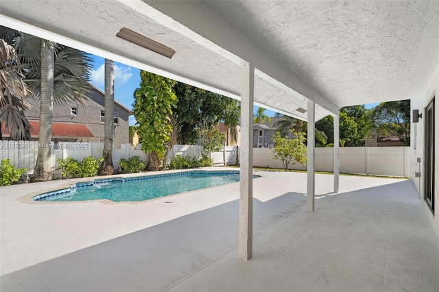 view of pool featuring a patio area