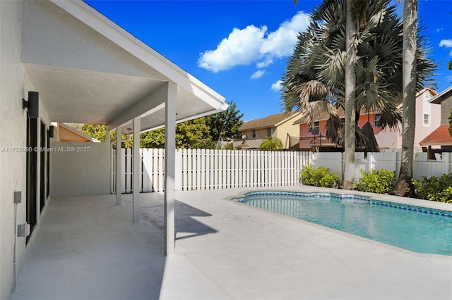 view of pool featuring a patio