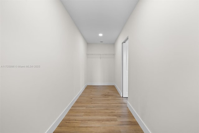 hallway featuring light hardwood / wood-style floors