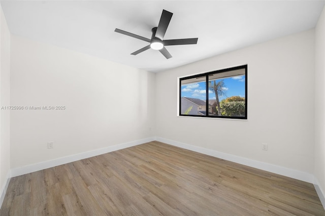 unfurnished room featuring ceiling fan and light hardwood / wood-style flooring