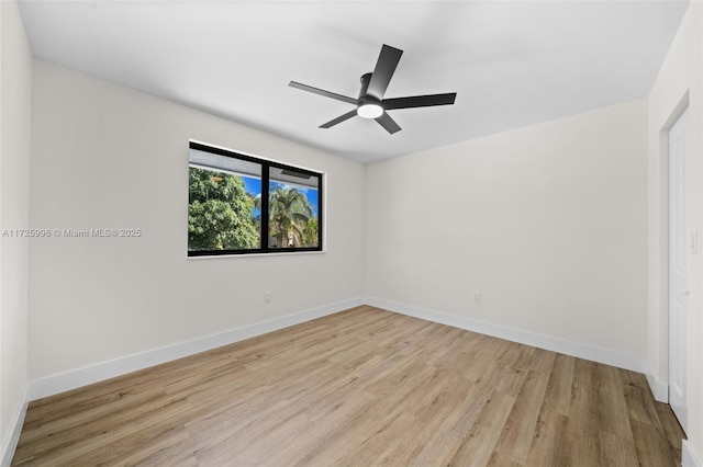 unfurnished room with ceiling fan and light hardwood / wood-style flooring