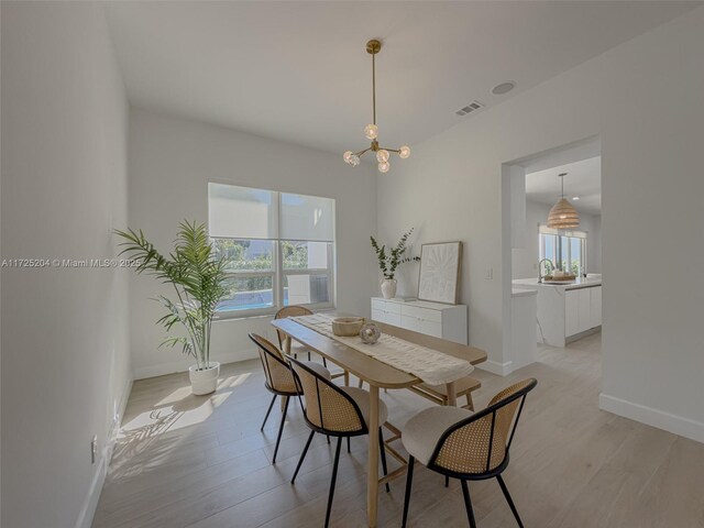 sitting room with hardwood / wood-style flooring