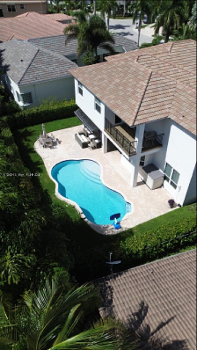 view of pool featuring an outdoor hangout area and a patio area