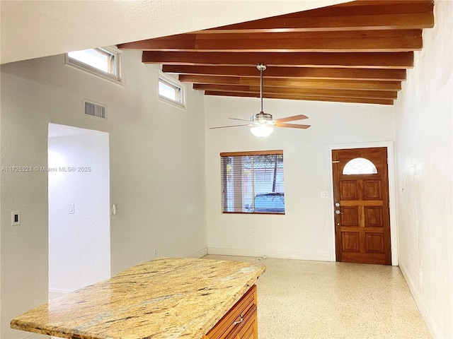 6181 SW 20th St, West Miami, FL 33155 - foyer with beam ceiling, a ceiling fan, dark aggregate flooring, a high ceiling, and baseboards