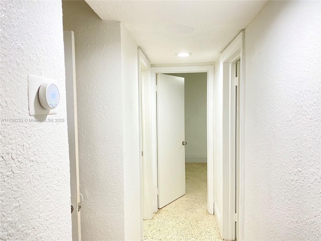 6181 SW 20th St, West Miami, FL 33155 - corridor featuring a textured wall and speckled floor