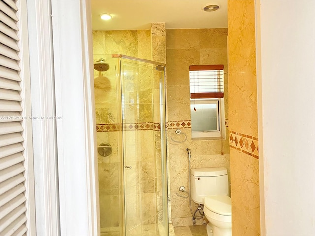 6181 SW 20th St, West Miami, FL 33155 - full bathroom with tile walls, toilet, a shower stall, recessed lighting, and tile patterned floors