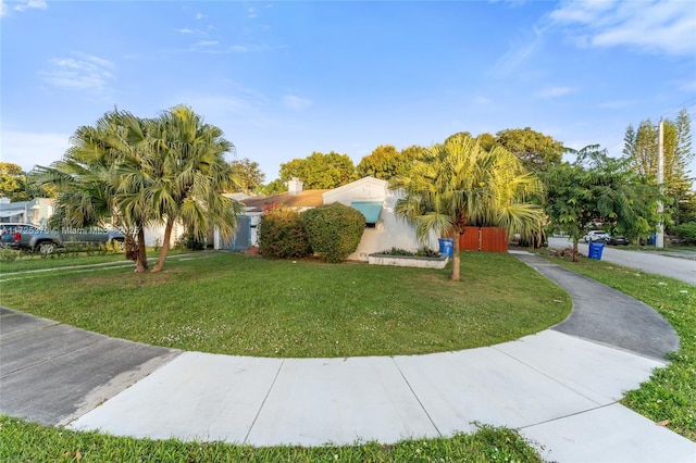 view of front of home with a front yard