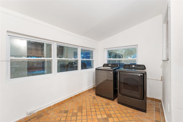 laundry room with washer and dryer