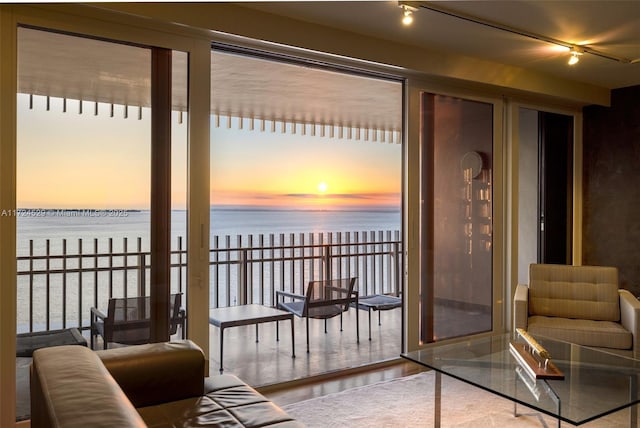 living room featuring a water view