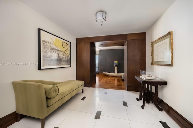 sitting room featuring light tile patterned flooring