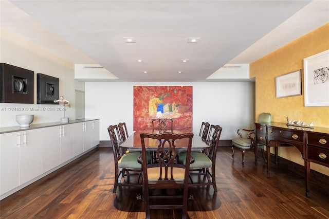 dining room with dark wood-type flooring