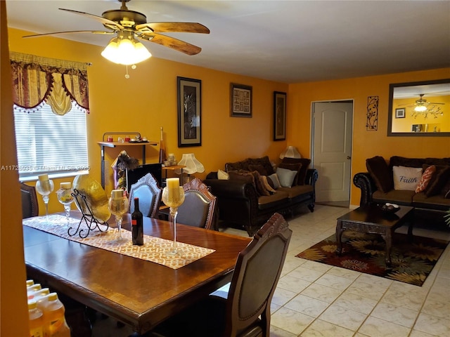 dining area featuring light tile patterned flooring and ceiling fan