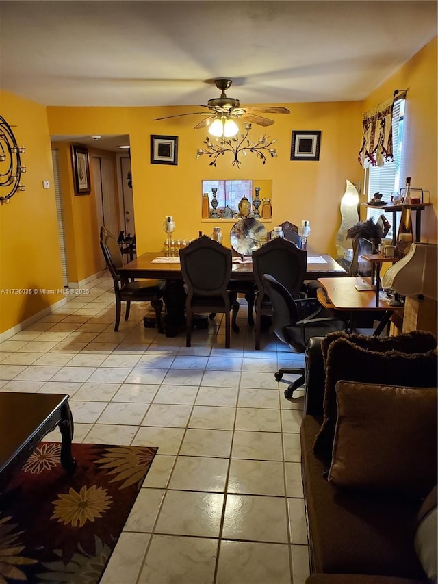 dining room with ceiling fan and light tile patterned floors