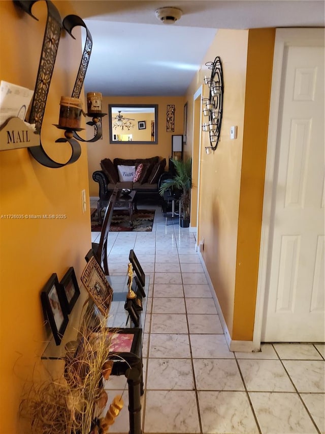 corridor with tile patterned flooring