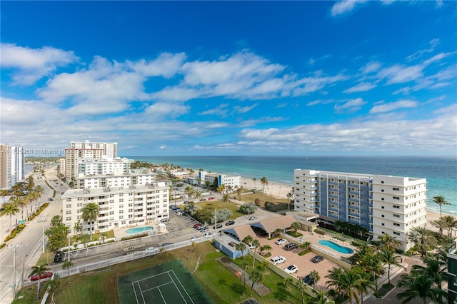 drone / aerial view featuring a view of the beach and a water view