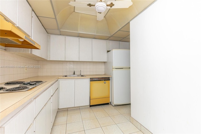 kitchen with white fridge, white cabinets, stainless steel gas cooktop, and dishwasher