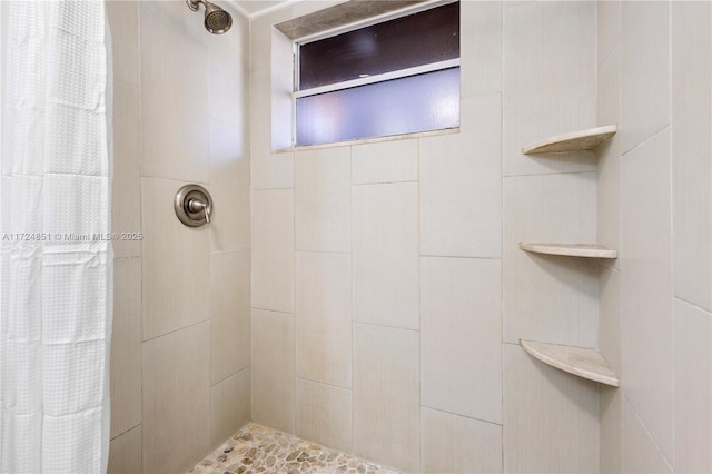 bathroom with curtained shower