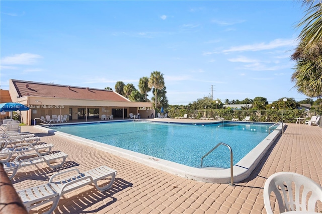 view of pool with a patio area