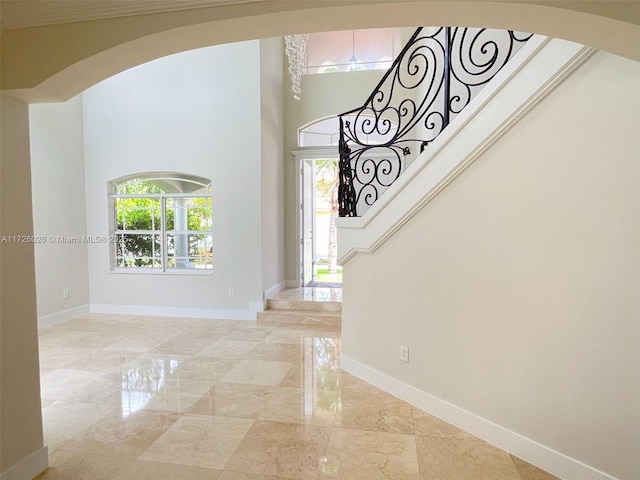 entrance foyer featuring a high ceiling