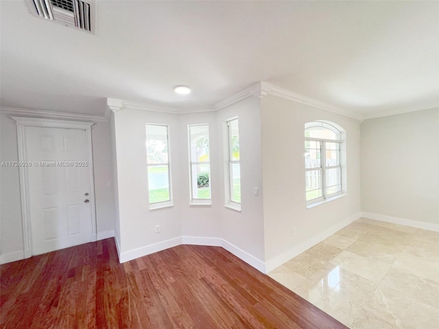 interior space with crown molding