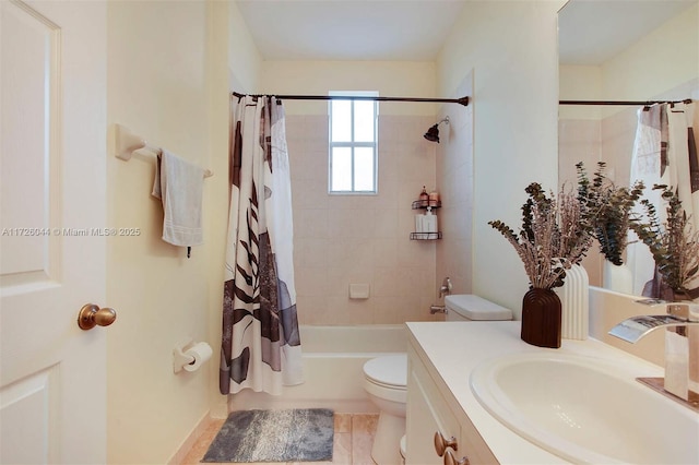 full bathroom with tile patterned flooring, vanity, shower / tub combo with curtain, and toilet