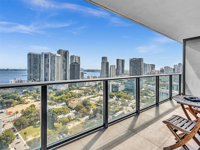 balcony featuring a water view