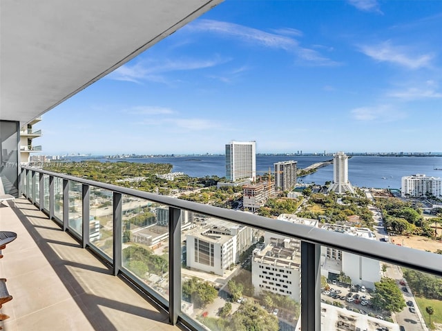 balcony featuring a water view