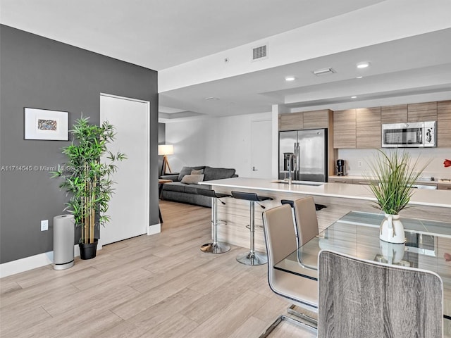 dining room featuring sink