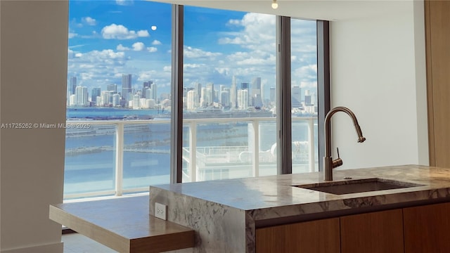 kitchen featuring sink and floor to ceiling windows