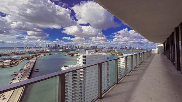 balcony featuring a water view