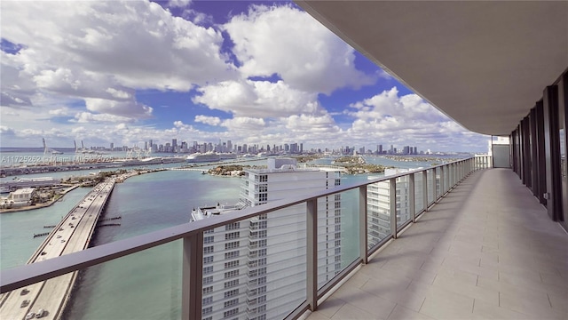 balcony featuring a water view