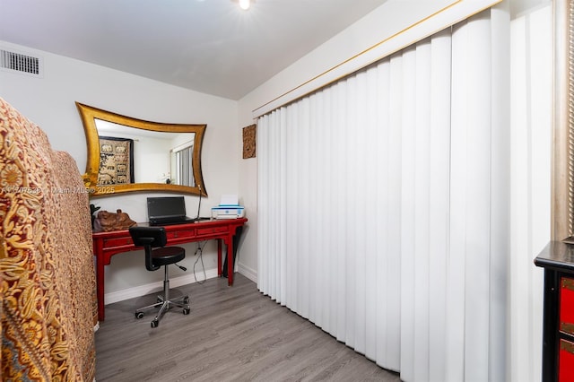 office area with hardwood / wood-style flooring