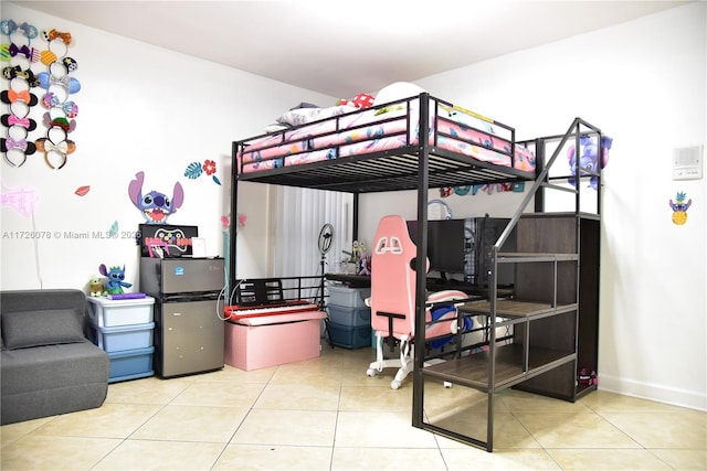 bedroom featuring light tile patterned floors