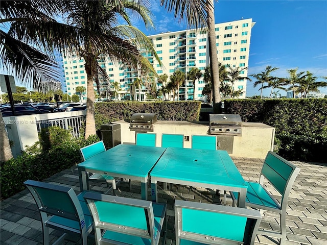 view of patio with a grill and area for grilling