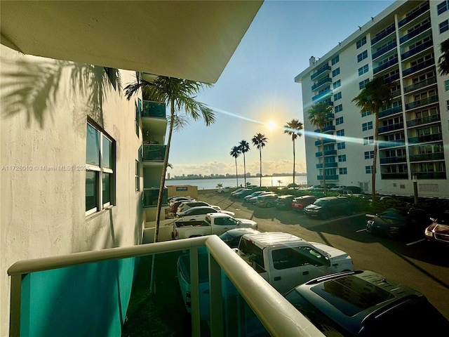 balcony featuring a water view