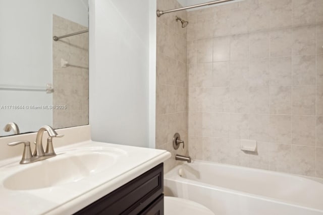 bathroom with vanity, toilet, and shower / bath combination