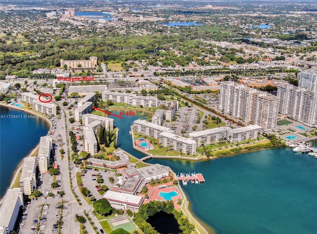 birds eye view of property featuring a water view