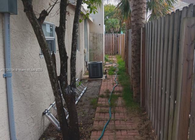 view of property exterior featuring cooling unit