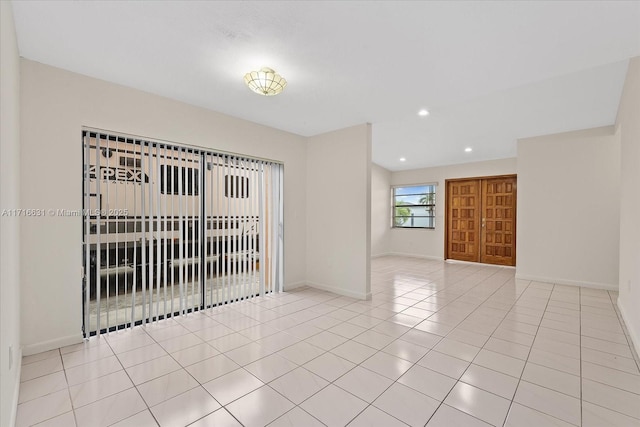 empty room featuring light tile patterned flooring