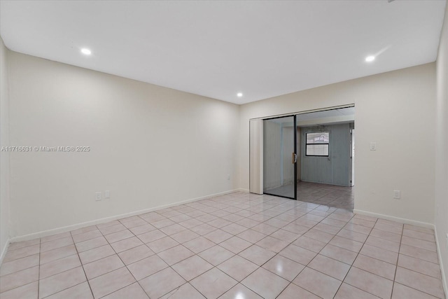 view of tiled spare room