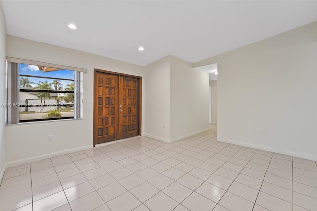 view of tiled spare room