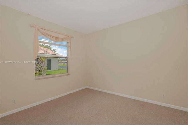 empty room featuring carpet