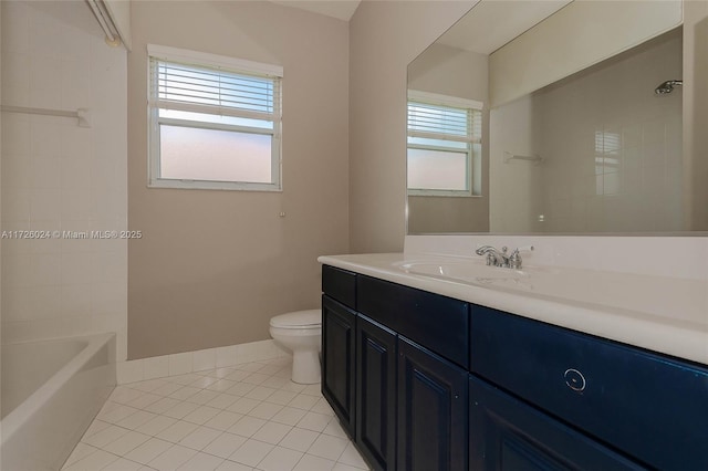 full bathroom featuring a wealth of natural light, tile patterned floors, vanity, and toilet