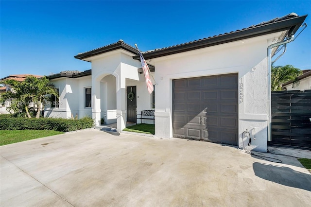 view of front of property with a garage