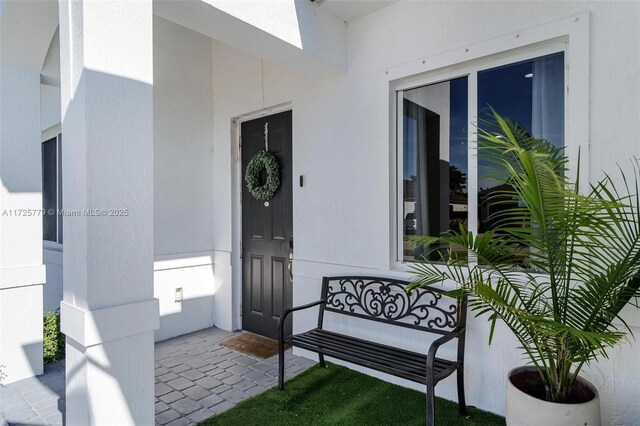 18253 SW 152nd Pl, Miami, FL 33187 - doorway to property with a porch