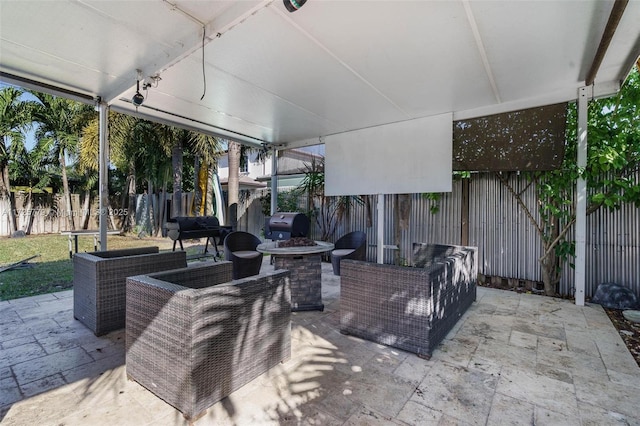 18253 SW 152nd Pl, Miami, FL 33187 - view of patio / terrace with an outdoor living space with a fire pit